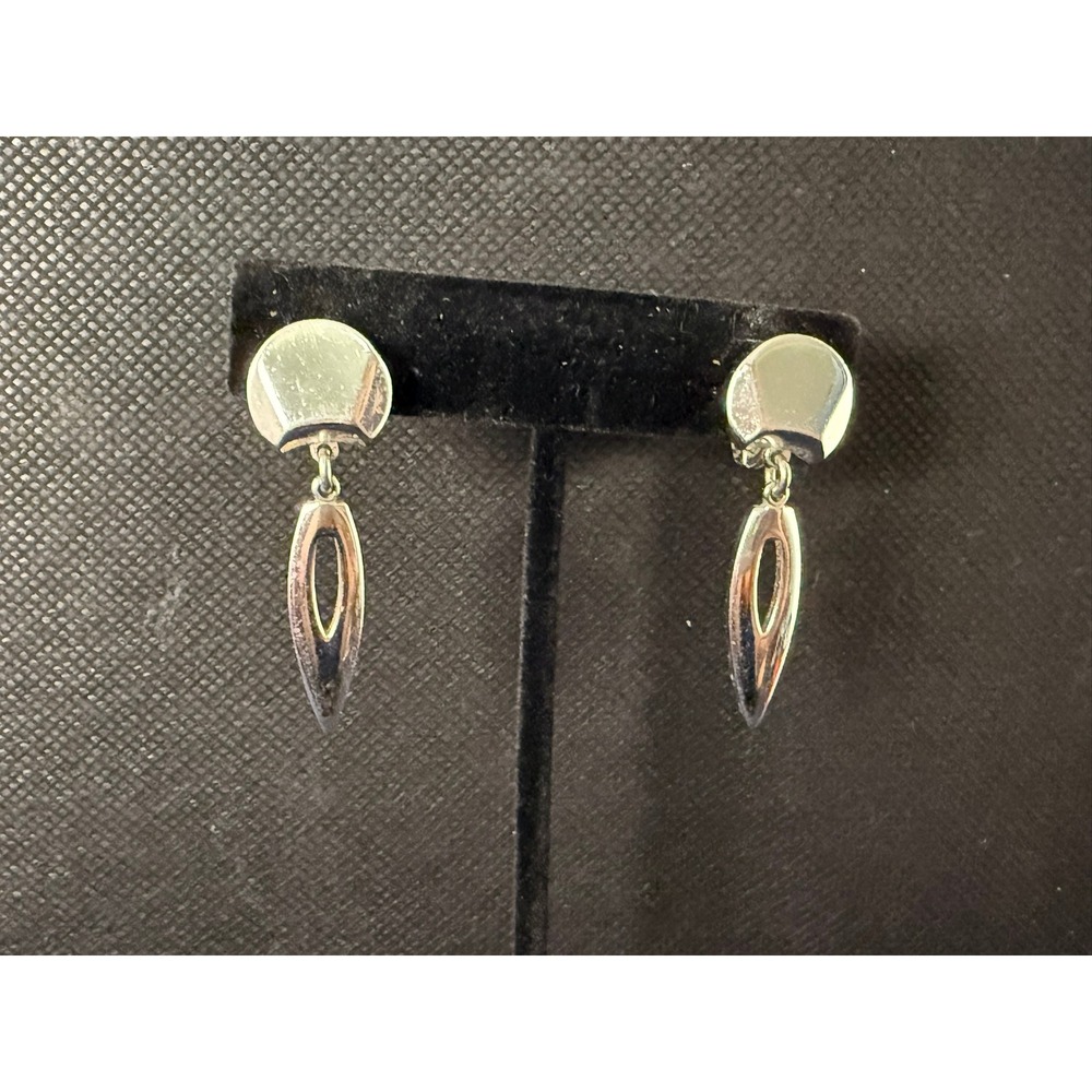 Monet Silver Dangle Clip‑On Earrings – Modern Oval Cutout Teardrop Design